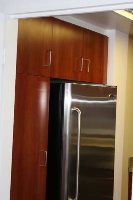 Cherry refrigerator surround with full-height panels